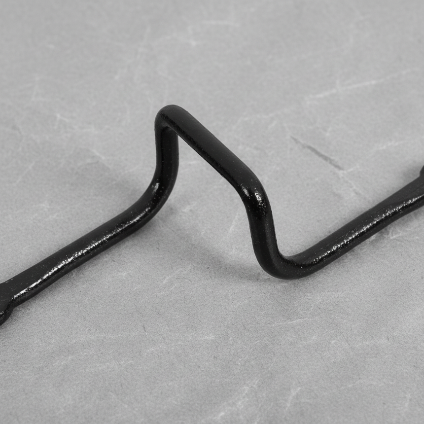 Macro Crop Middle - Hood Latch Striker Plate