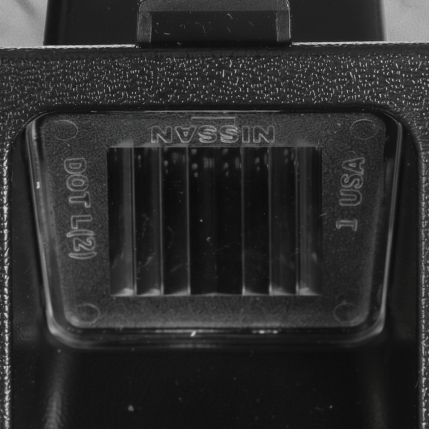 2016-2025 Nissan Titan Titan XD Frontier Rear License Plate Light OEM - Top Detail Angle 2