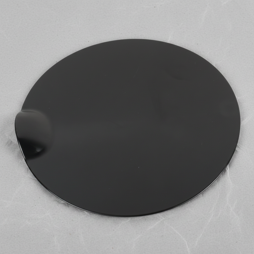 Full view of Ford F-150 fuel tank filler door on light grey wrinkled kraft paper