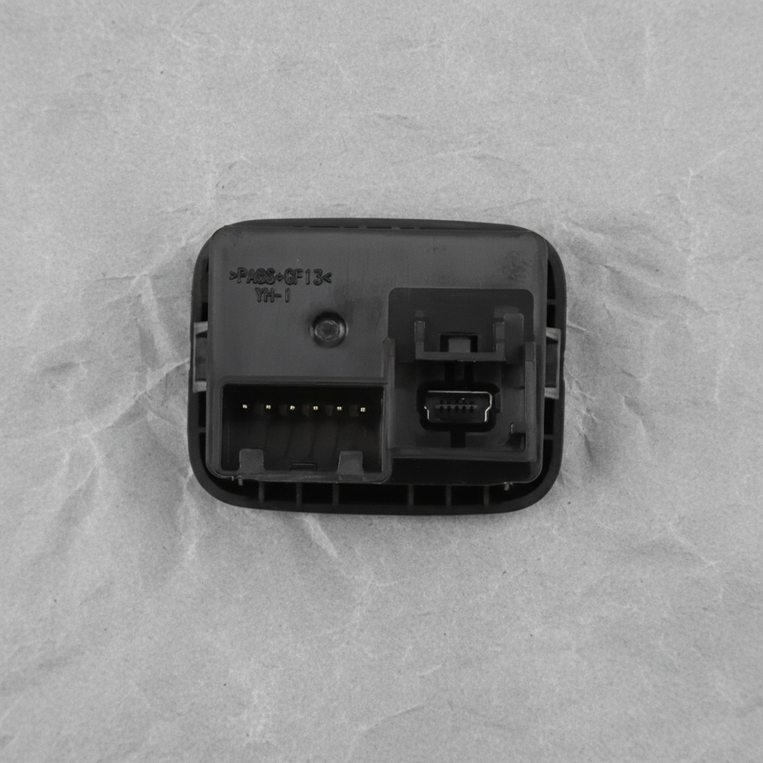 Close-up alternate angle of GM OEM Jet Black Multimedia Receptacle