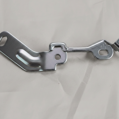 Bottom macro crop on light grey wrinkled kraft paper background