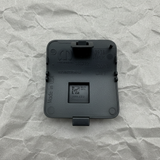 Close-up alternate angle of Mopar OEM Textured Front Tow Hook Cover for Grand Cherokee L