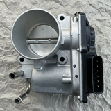2018-2025 Nissan Kicks Versa Genuine OEM 1.6L L4 Gas Throttle Body - Middle Detail