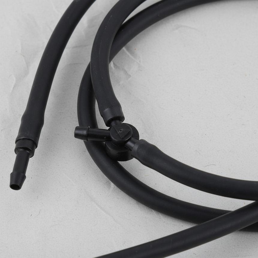 2014-20 Nissan Rogue Genuine OEM Front Windshield Washer Hose to Nozzle Macro Crop