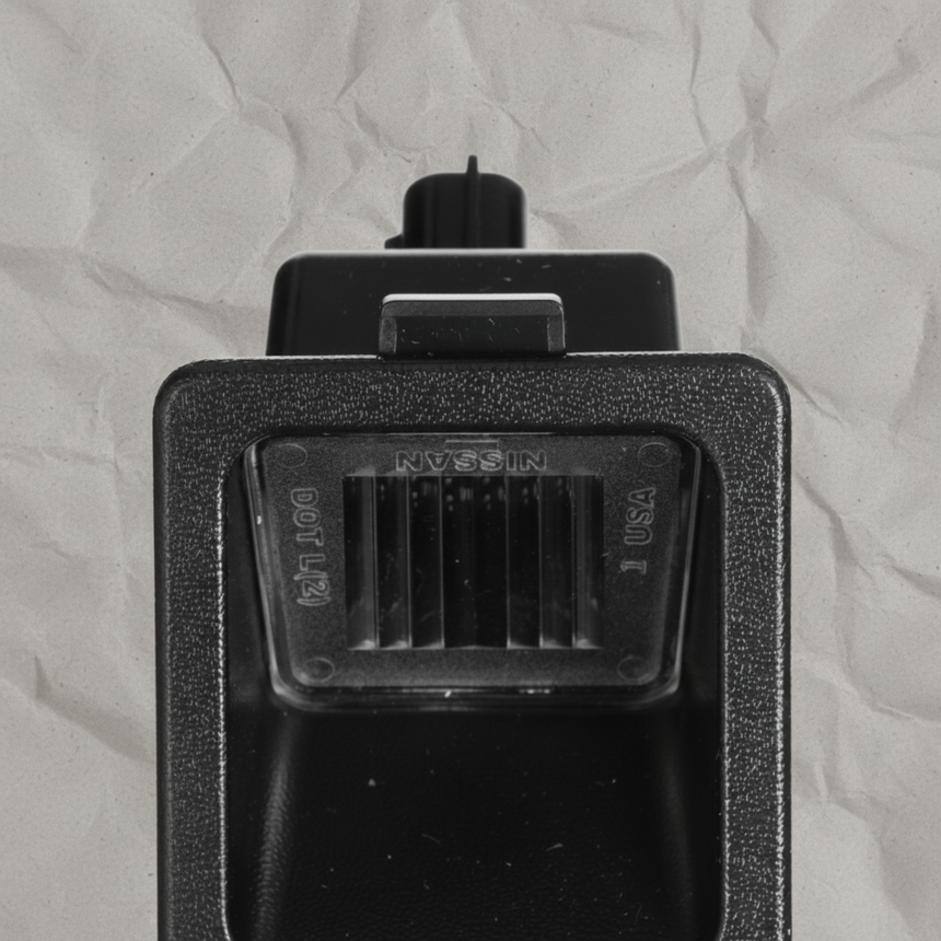2016-2025 Nissan Titan Titan XD Frontier Rear License Plate Light OEM - Middle Detail Angle 2